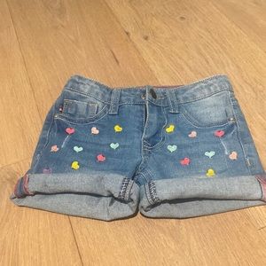 Embroidered heart stretchy jean shorts